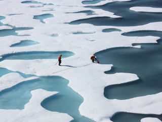 Illustration for article titled Melt Ponds on Ice Sheets Are Chillingly Beautiful